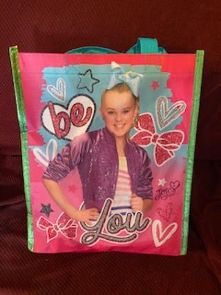 JOJO SIWA bag with itmes in it