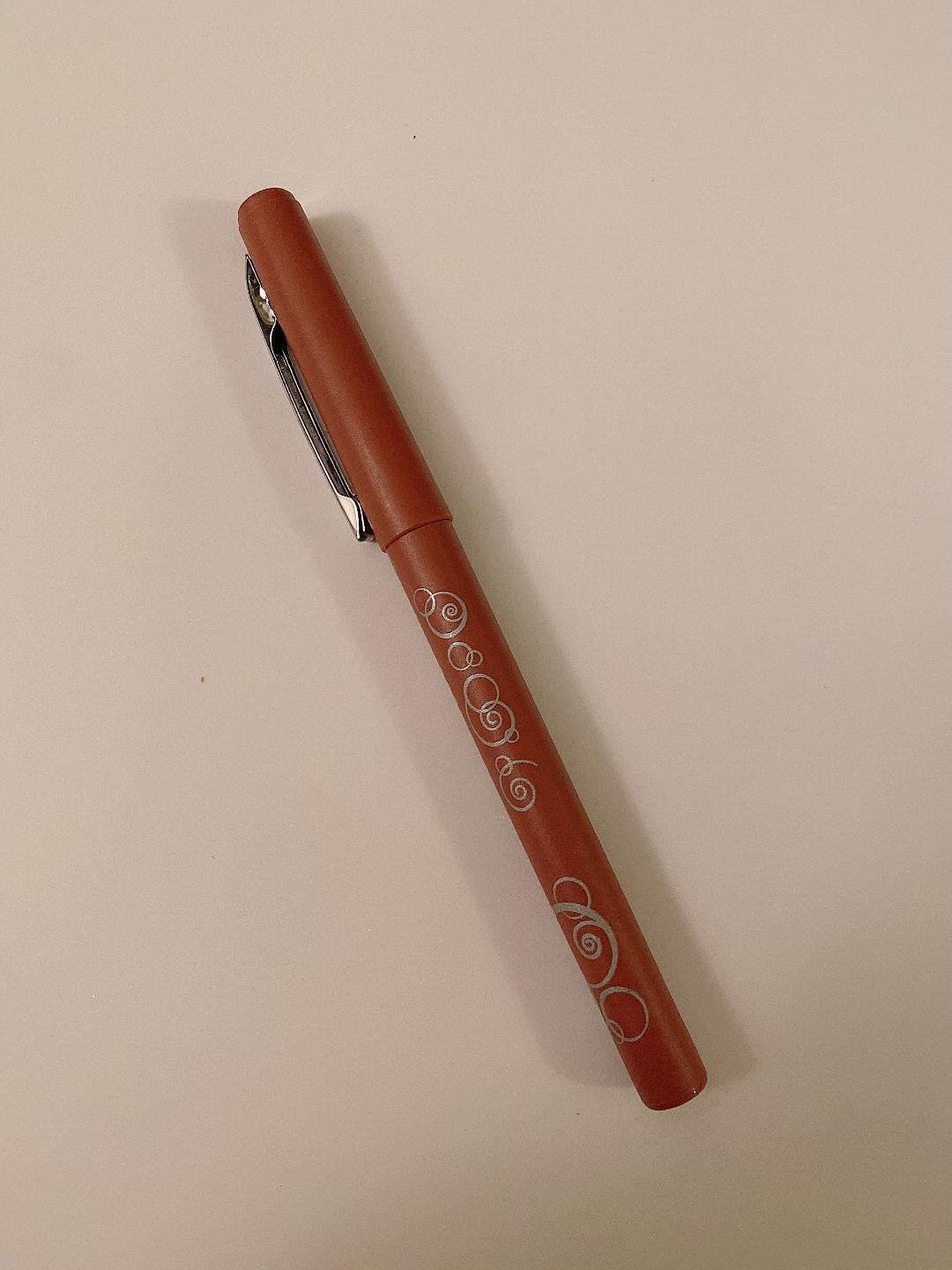 brown pen